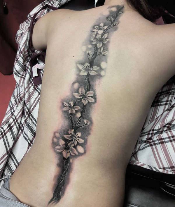vine spine tattoo